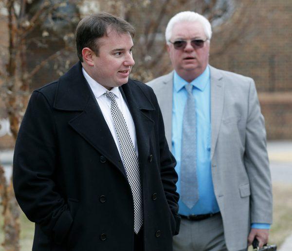 Louisiana Capital Assistance Center Staff Attorney Elliott Brown and court-appointed Attorney Steve Barnette, who are representing Dakota Theriot in his extradition hearing, speak outside court in Warsaw, Va., on Feb. 1, 2019. (AP Photo/Steve Helber)