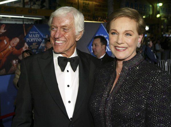 Julie Andrews (R) poses with actor Dick Van Dyke at Disney's "Mary Poppins" 40th Anniversary Edition DVD release party at El Capitan Theater in Los Angeles, California on Nov. 30, 2004. (Kevin Winter/Getty Images)