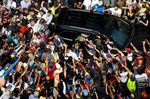 Venezuelan opposition leader and self-proclaimed interim president Juan Guaido is greeted by supporters as he leaves a rally against Venezuelan President Nicolas Maduro's government in Caracas, Venezuela,on February 2, 2019. (Adriana Loureiro/REUTERS)