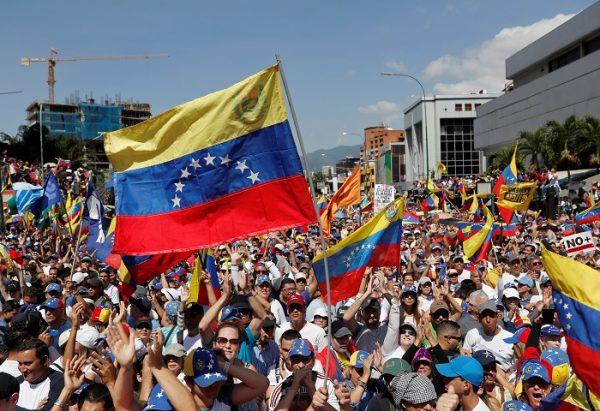Opposition supporters take part in a rally against Venezuelan President Nicolas Maduro's government in Caracas, Venezuela ,on February 2, 2019. (Carlos Garcia Rawlins/REUTERS)