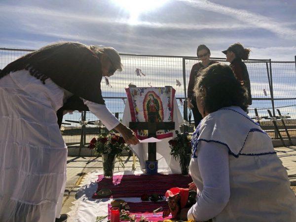 Sylvia Ledesma (L), and Lorrain Cordova prepare for a service to remember the victims and call for more protection for marginalized and vulnerable women in Albuquerque, N.M., on Feb. 2, 2019. (Mary Hudetz/AP Photo)