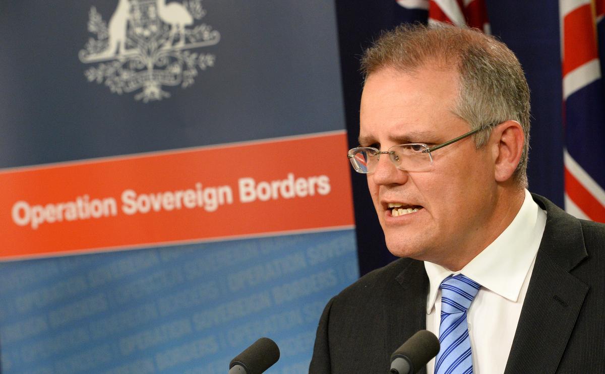 Australian Minister for Immigration and Border Protection Scott Morrison speaks on the new federal government's Operation Sovereign Borders policy during a press conference in Sydney on September 23, 2013. (William West/AFP/Getty Images)