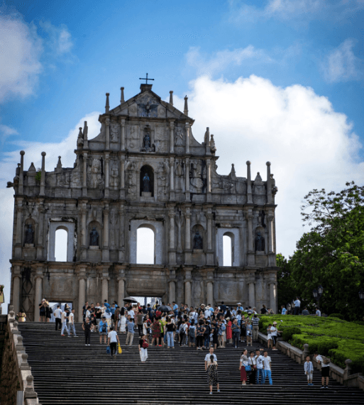 A glimpse of the ruins of St. Paul's Cathedral through a narrow street on the Macao Peninsula. (Macao Government Tourism Office)