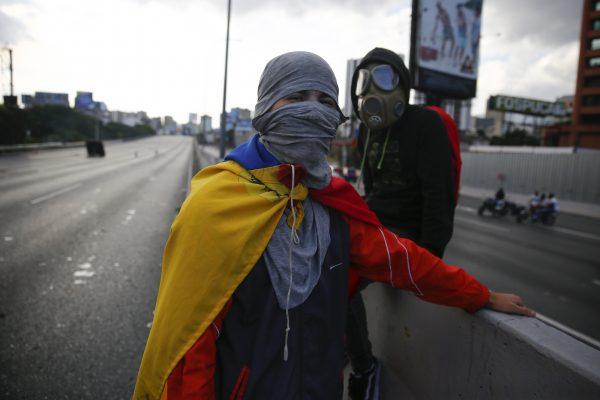 Demonstrators protest against the government of Nicolás Maduro in the main highway of Caracas on Feb. 2, 2019 in Caracas, Venezuela. (Marco Bello/Getty Images)