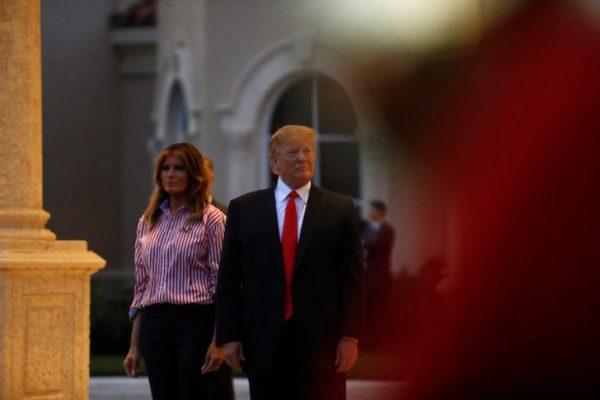 President Donald Trump and First Lady Melania Trump watch the Florida Atlantic University Marching Band during a Super Bowl LIII party at Trump International Golf Course in West Palm Beach, Fla., on Feb. 3, 2019. (Eric Thayer/Reuters)