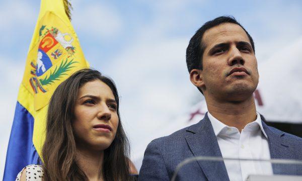 Opposition leader of Venezuela Juan Guaidó delivers a speech next to his wife Fabiana Rosales during a demonstration in Caracas, Venezuela, on Jan. 26, 2019. (Marco Bello/Getty Images)