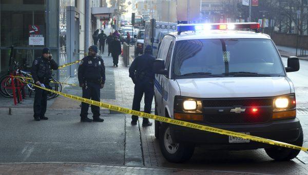 Baltimore Police block off Penn Street at Lombard after a shooting at the University of Maryland Medical Center Shock Trauma in Baltimore, on the morning of Feb. 4, 2019. (Jerry Jackson/The Baltimore Sun via AP)