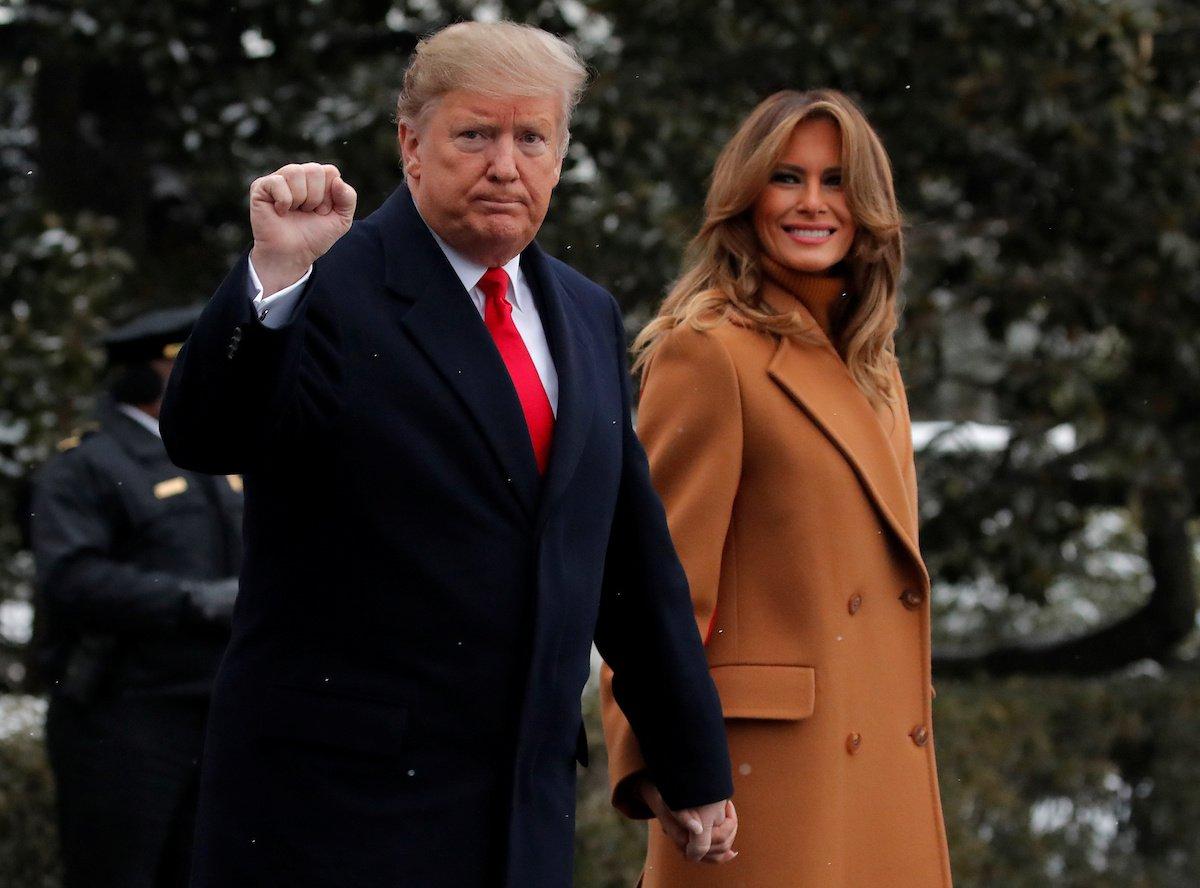 U.S. President Donald Trump walks with first lady Melania Trump while departing for Palm Beach, Florida from the White House in Washington, U.S., Feb.1, 2019. (Reuters/Jim Young)