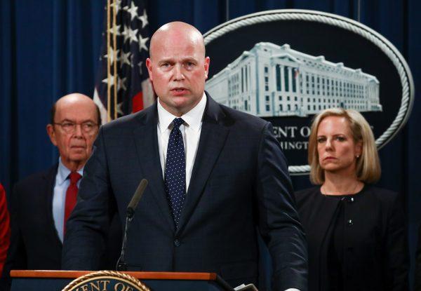 Acting Attorney General Matthew Whitaker announces indictments against Chinese telecommunications company Huawei, with Commerce Secretary Wilbur Ross, Homeland Security Secretary Kirstjen Nielsen, and the officials at the Department of Justice in Washington on Jan. 28, 2019. (Charlotte Cuthbertson/The Epoch Times)
