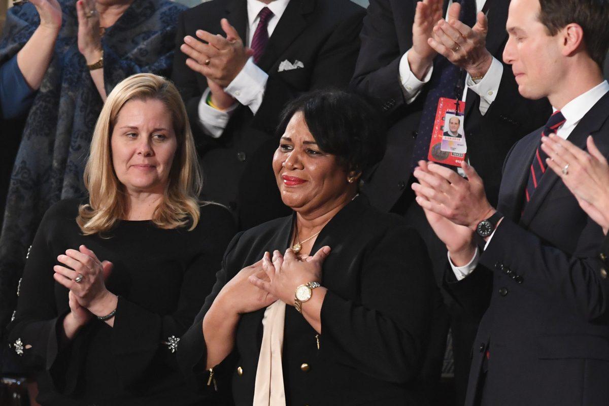 Alice Johnson (C), one of President Donald Trump's special guests, reacts as the president acknowledges her during his State of the Union address at the Capitol in Washington on Feb. 5, 2019. (SAUL LOEB/AFP/Getty Images)