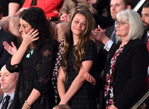 Heather Armstrong, Madison Armstrong and Debra Bissell are recognized by US President Donald Trump during the State of the Union address at the US Capitol on Feb. 5, 2019. (SAUL LOEB/AFP/Getty Images)
