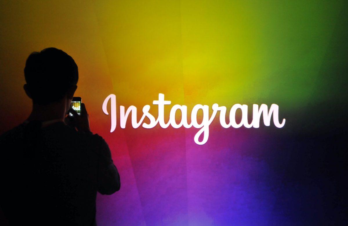 An Instagram employee takes a video in Menlo Park, Calif., on June 20, 2013. (Josh Edelson/AFP/Getty Images)