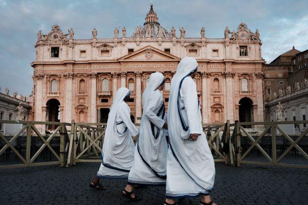A group of nuns walk through St. Peter's Square at dawn on Sept. 3, 2018 in Vatican City, Vatican. (Spencer Platt/Getty Images)
