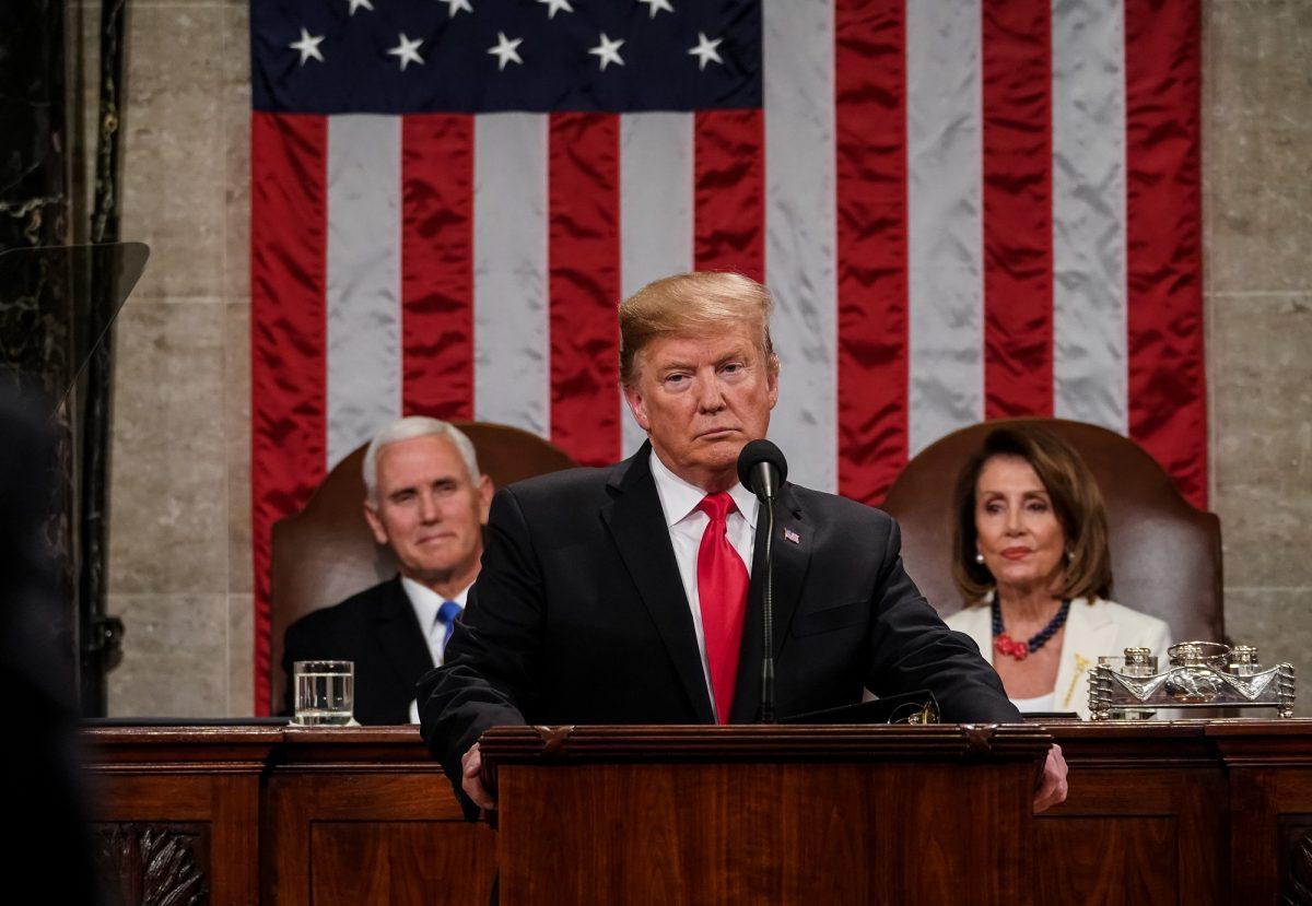 President Donald Trump, with Speaker Nancy Pelosi and Vice President Mike Pence looking on, delivers the State of the Union address in the chamber of the U.S. House of Representatives at the U.S. Capitol Building in Washington on Feb. 5, 2019. (Doug Mills-Pool/Getty Images)