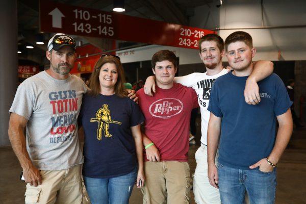 Dan Cooley (L) with wife and three sons before a Make America Great Again rally in Charleston, W. Va., on Aug. 21, 2018. (Charlotte Cuthbertson/The Epoch Times)