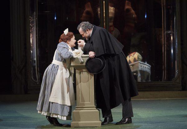 Soprano Tracy Dahl as Despina and baritone Russell Braun in the Canadian Opera Company’s 2019 production of "Così fan tutte." (Michael Cooper)