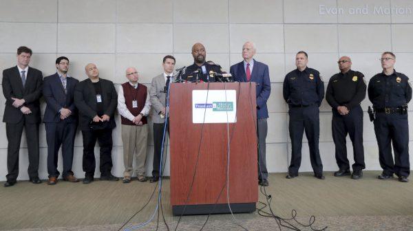 Milwaukee Assistant Police Chief Michael Brunson surrounded by law enforcement officials during a press conference at Froedtert Hospital in Milwaukee, Wis., on Feb. 6, 2019. (Mike De Sisti/Milwaukee Journal-Sentinel via AP)