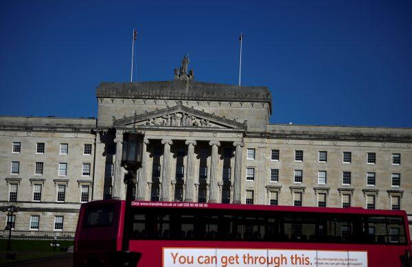 A bus drives in front of Stormont Parliament Building in Belfast, Northern Ireland Feb. 6, 2019. (Reuters/Clodagh Kilcoyne)