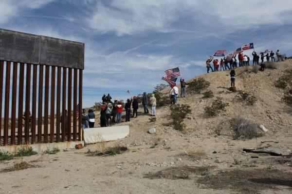 Supporters of wall construction along the southern border of the U.S. form a “human wall” at the border between Sunland Park, N.M., and Ciudad Juarez, Chihuahua State, Mexico, on Feb. 9, 2019. (Herika Martinez/AFP/Getty Images)