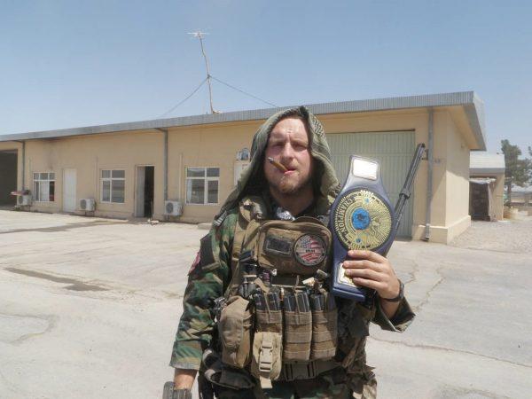 Staff Sergeant Kevin Flike enjoying a cigar during his second deployment to Kunduz, Afghanistan 2011. (Courtesy of Kevin Flike)