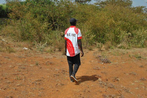 Frederick Otieno leads us into a bush where stolen donkeys are normally killed and sold out to the Chinese abattoirs on Feb. 5, 2018. (Dominic Kirui for The Epoch Times)