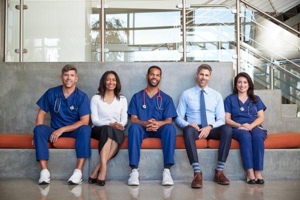 Sitting in the center. (Monkey Business Images/Shutterstock)