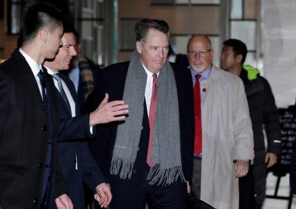 U.S. trade representative Robert Lighthizer (C), a member of the U.S. trade delegation to China, arrives at a hotel in Beijing on Feb. 12, 2019. (Jason Lee/Reuters)