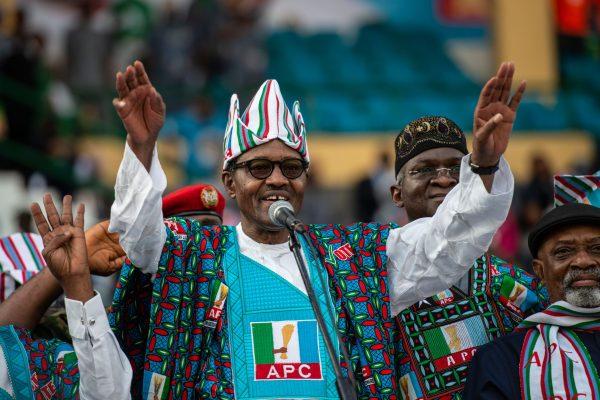 Nigeria's President Muhammadu Buhari of the ruling party All Progressive Congress (APC) waves at the crowd of APC supporters upon his arrival for a political campaign rally at the Teslim Balogun Stadium in Lagos on Feb. 9, 2019. (Stefan Heunis/AFP/Getty Images)