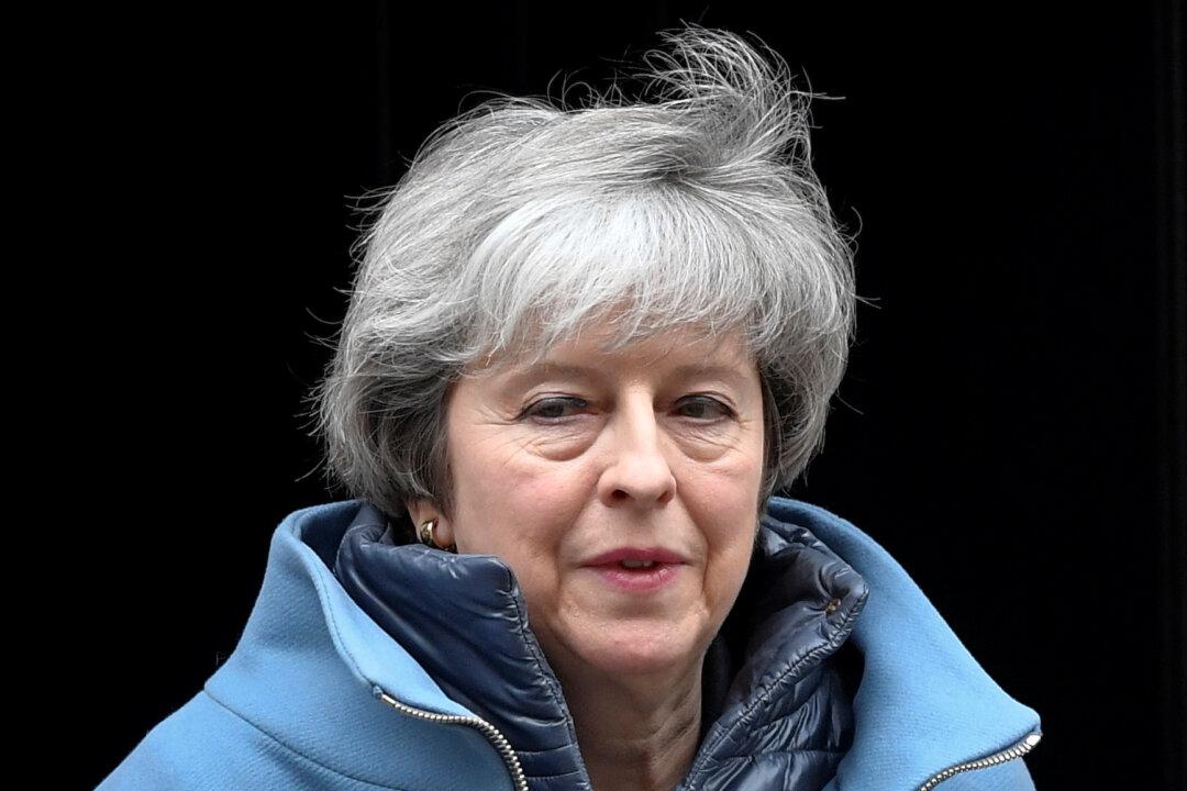 UK PM May calls knife-crime meeting amid row over police funding