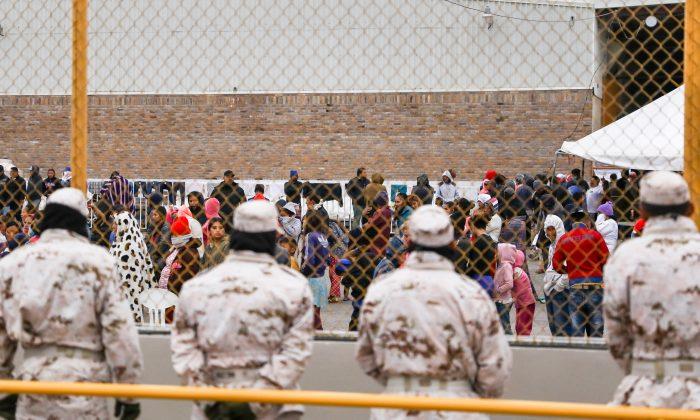 Migrants Riot, Burn Mattress in Tijuana Immigration Facility