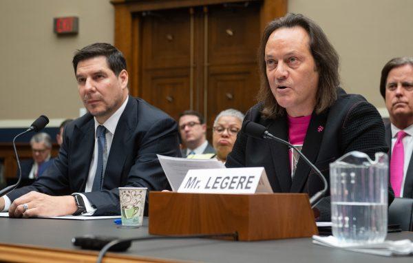 John Legere (R), CEO and President of T-Mobile US, and Marcelo Claure, Executive Chairman of Sprint, testify about the T-Mobile and Sprint merger during a House Energy and Commerce Subcommittee on Communications and Technology hearing on Capitol Hill in Washington on Feb. 13, 2019. (Saul Loeb/AFP/Getty Images)