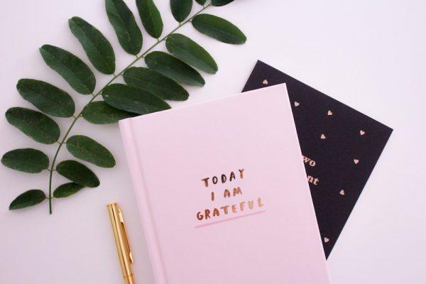 Keeping a gratitude journal can help reinforce a mindset of gratitude—and increase happiness as a result. (Unsplash)