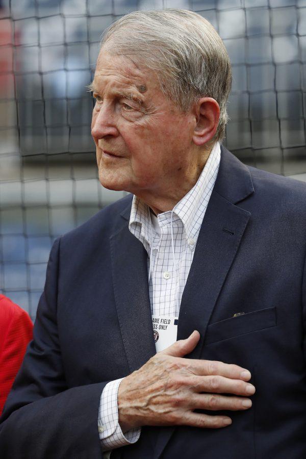Judge William Webster, former FBI and CIA director, stands during the national anthem before a game between the Atlanta Braves and Washington Nationals at Nationals Park on Aug. 7, 2018, in Washington. (Patrick McDermott/Getty Images)