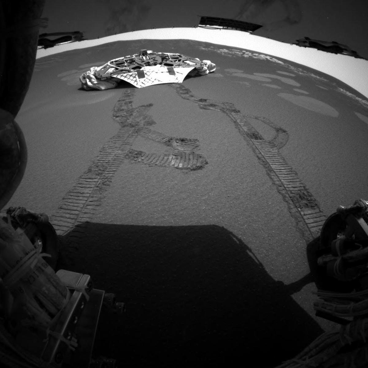 One of the rear hazard-avoidance cameras on NASA's Opportunity rover on Feb. 5, 2004. (NASA/JPL via AP)