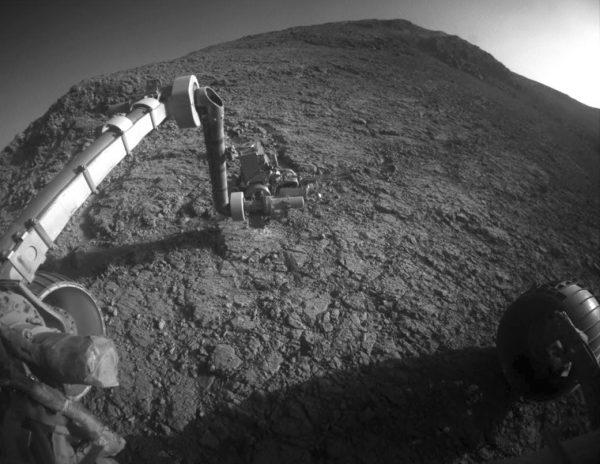 The tool turret at the end of the Opportunity rover's robotic arm on the southern side of "Marathon Valley," which goes through the western rim of Endeavour Crater, on Jan. 5, 2016. (NASA/JPL-Caltech via AP)