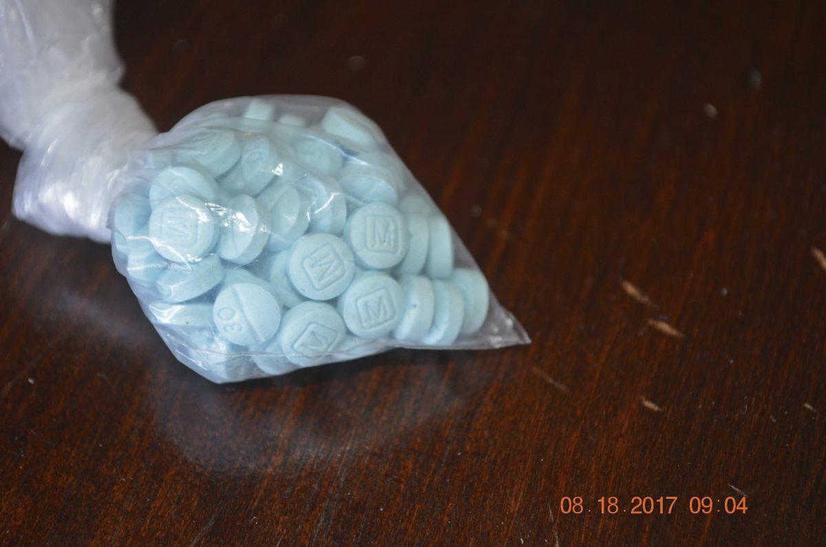 This photo provided by the U.S. Drug Enforcement Administration's Phoenix Division shows a closeup of fentanyl-laced sky blue pills known on the street as "Mexican oxy." (Drug Enforcement Administration via AP)