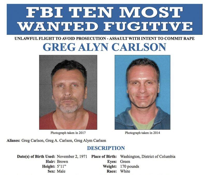 FBI shows an FBI wanted poster of Greg Alyn Carlson released on Thursday, Sept. 27, 2018. (FBI via AP, File)