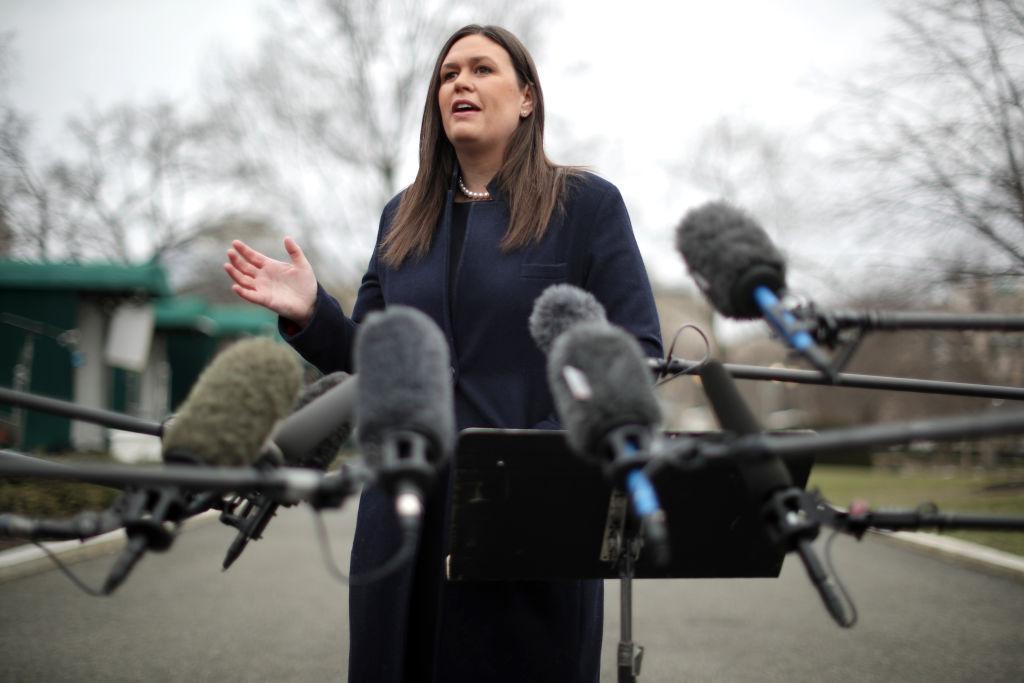 White House press secretary Sarah Sanders talks to reporters following a television interview with FOX News outside the White House in Washington on Jan. 23, 2019. (Chip Somodevilla/Getty Images)