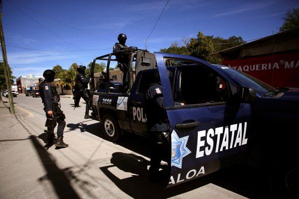 State police patrol ahead of the visit of Mexico's President Andres Manuel Lopez Obrador to Badiraguato, in the Mexican state of Sinaloa, Mexico on Feb. 15, 2019. (Daniel Becerril/Reuters)