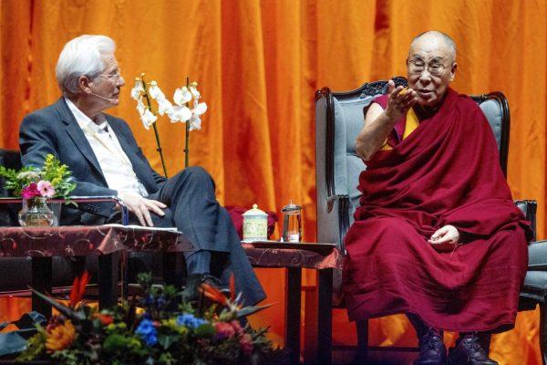 Tibetan spiritual leader Dalai Lama (R) speaks with American actor Richard Gere (L) during a lecture about the International Campaign for Tibet at Ahoy in Rotterdam, on Sept. 16, 2018. (Robin Utrecht/AFP/Getty Images)