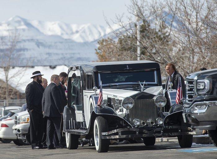 The hearse awaits Laurie Holt's casket at the Summerhill Stake Center after the funeral on Feb. 16, 2019, in Riverton, Utah. (Rick Egan/The Salt Lake Tribune via AP)