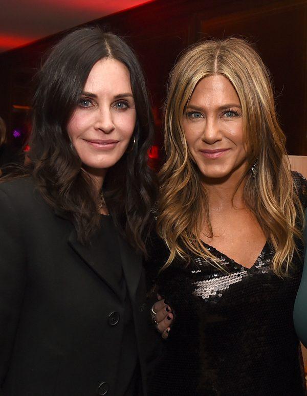 Courteney Cox (L) and Jennifer Aniston pose at the after party for the premiere of Netflix's "Dumplin'" at Sunset Tower in Los Angeles, on Dec. 6, 2018. (Kevin Winter/Getty Images)