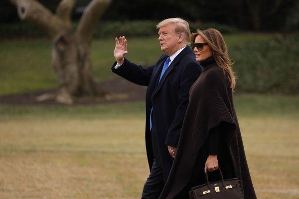 President Donald Trump and First Lady Melania Trump walk toward Marine One on the South Lawn of the White House prior to their departure, on February 15, 2019. (Alex Wong/Getty Images)