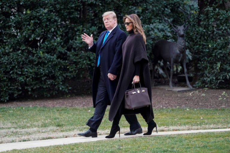 President Donald Trump and First Lady Melania Trump walk to Marine One as they depart for Palm Beach from the White House in Washington on Feb. 15, 2019. (Joshua Roberts/Reuters)