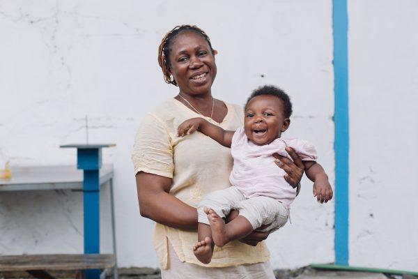 Paul Pascal's mother holds him after cleft lip and palate surgeries in Cameroon. (Shawn Thompson)