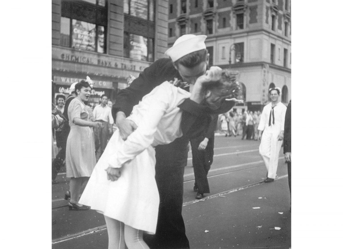 A sailor and a woman kiss in New York's Times Square, as people celebrate the end of World War II. (Victor Jorgensen/U.S. Navy, File)