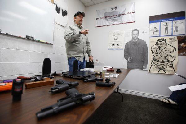A gun instructor teaches a packed class to obtain the Utah concealed gun carry permit on Jan. 9, 2016. (George Frey/Getty Images)