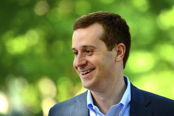 Ninth Congressional district Democratic candidate Dan McCready smiles as he speaks with U.S. Rep. Alma Adams outside Eastover Elementary School in Charlotte, N.C. (Jeff Siner/The Charlotte Observer via AP)