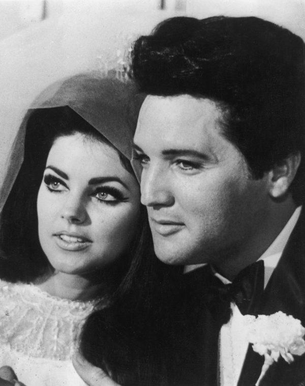 American rock n' roll singer and actor Elvis Presley (1935 - 1977) with his bride Priscilla Beaulieu after their wedding in Las Vegas on May 1, 1967. (Photo by Keystone/Getty Images)