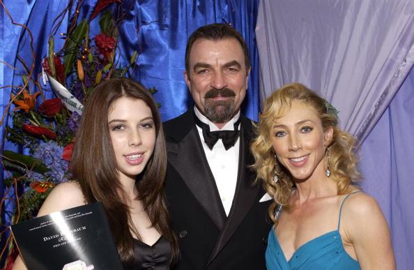 Actor Tom Selleck with wife, Jillie, and daughter, Hannah.  (©Getty Images | <a href="https://www.gettyimages.com/detail/news-photo/tom-selleck-daugher-hannah-and-wife-jillie-mack-are-seen-at-news-photo/51937669">Frazer Harrison</a>)